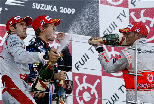 Себастьян Феттель празднует победу на Гран-при Японии