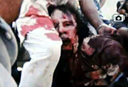 Смерть ливийского диктатора была жестокой и унизительной