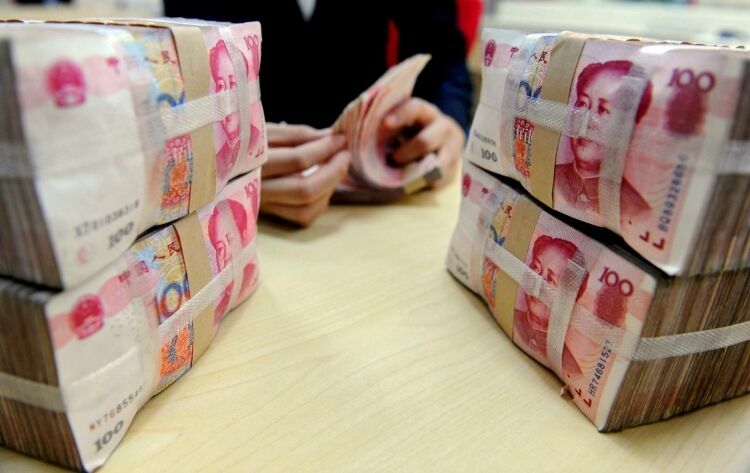 Юаню предрекли роль второй валюты в мире