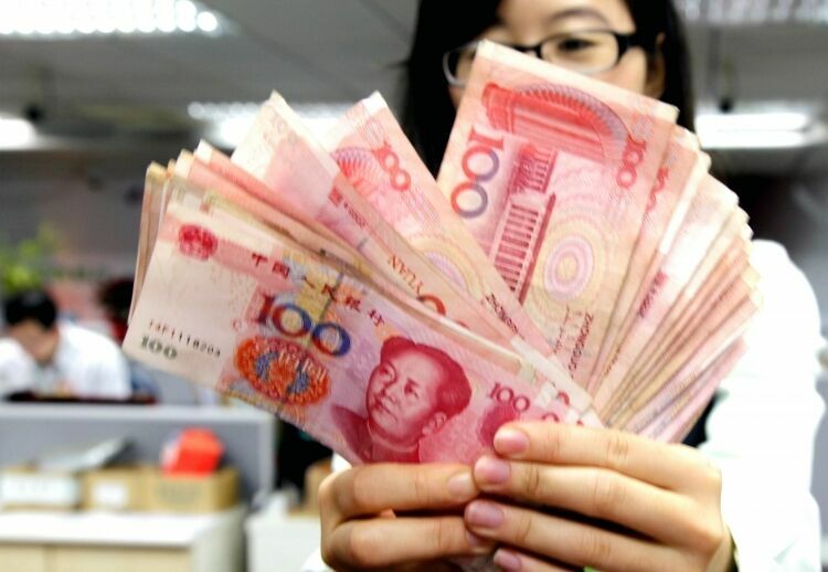 Курс юаня ослаблен до минимального значения с 2011 года