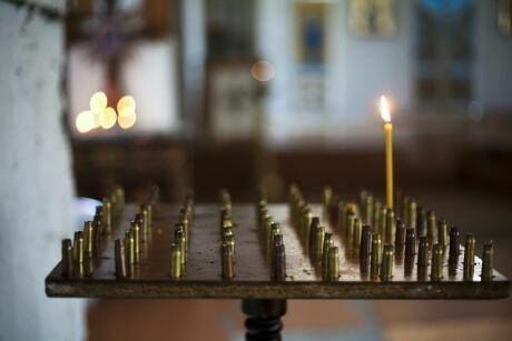 Святой Калаш: в храме на родине оружейника свечи горят в автоматных гильзах