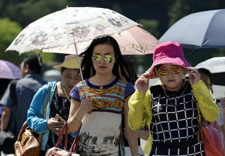 В Японии из-за жары госпитализированы почти 500 человек