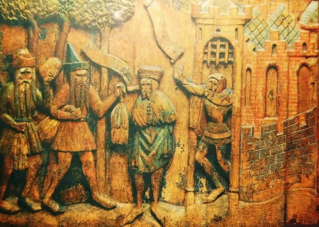 Русские предлагают свой товар (меха белки) приказчику подворья св. Петра в Новгороде. Резная панель из церкви св. Николая в Штральзунде. Около 1400 года