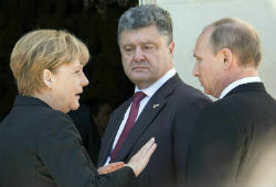 Владимир Путин пообщался в Нормандии с Порошенко и Меркель