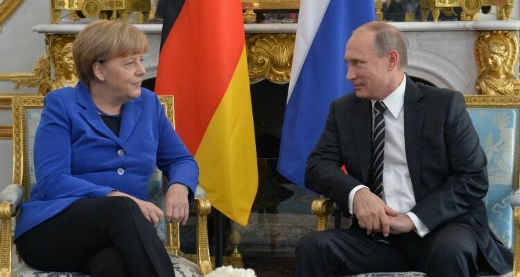 Путин встретился с Меркель перед заседанием «нормандской четверки»