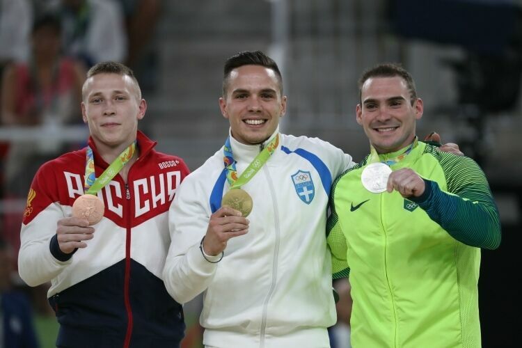 Российский гимнаст Денис Аблязин добыл две медали на отдельных снарядах