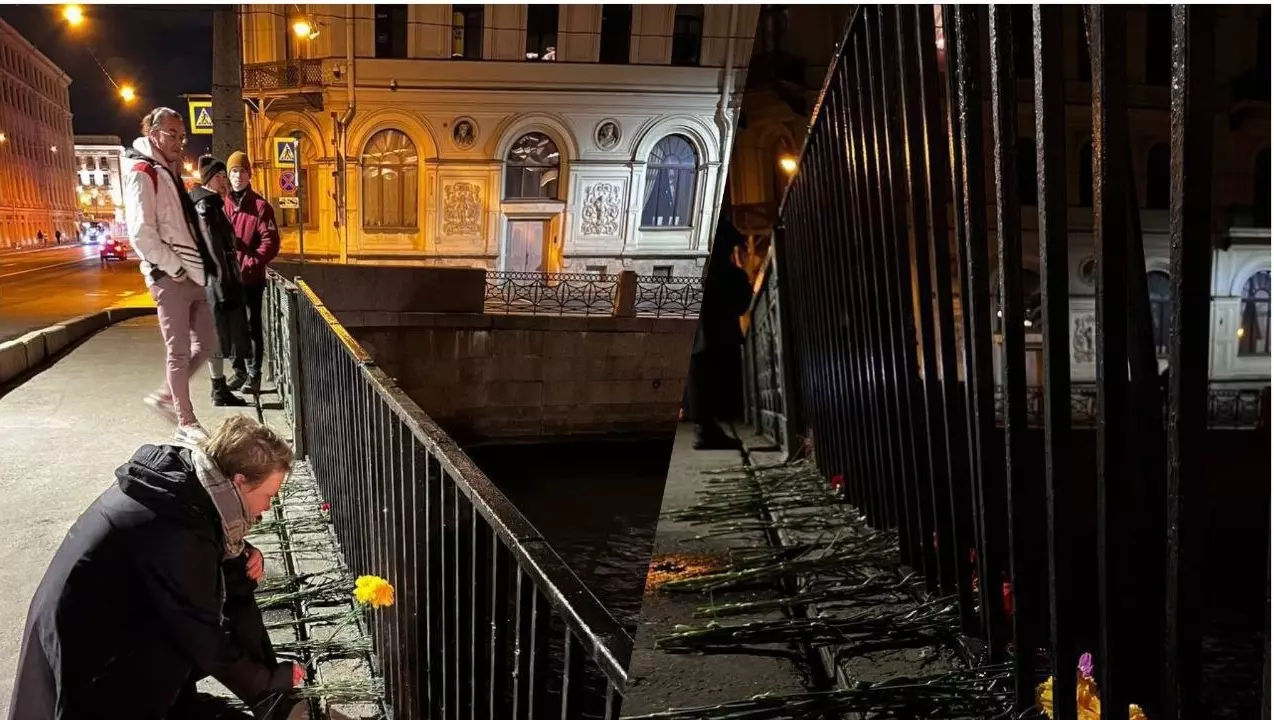 Жители Санкт-Петербурга несут цветы к месту трагедии