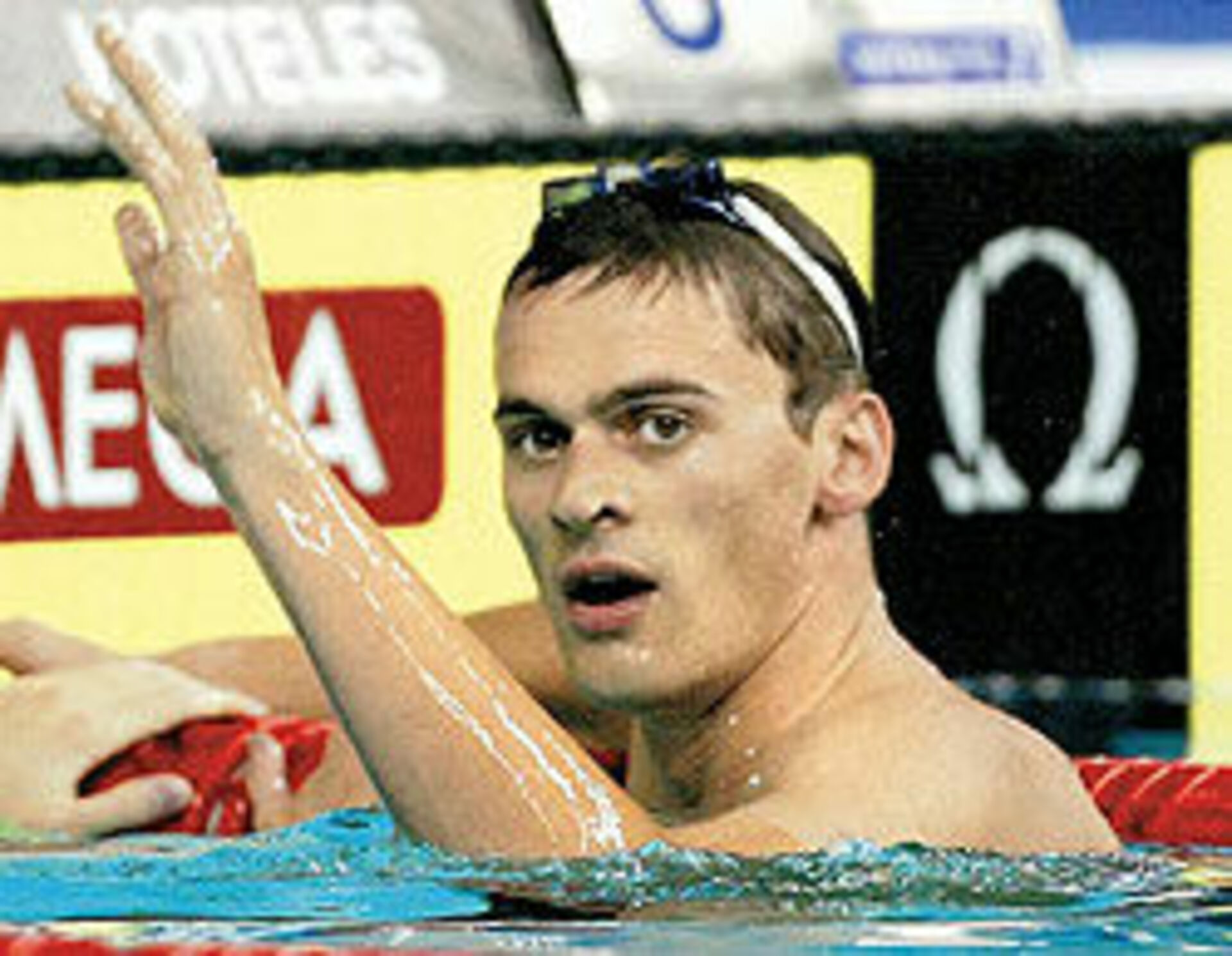 Олимпийский чемпион по плаванию Россия Александр Попов