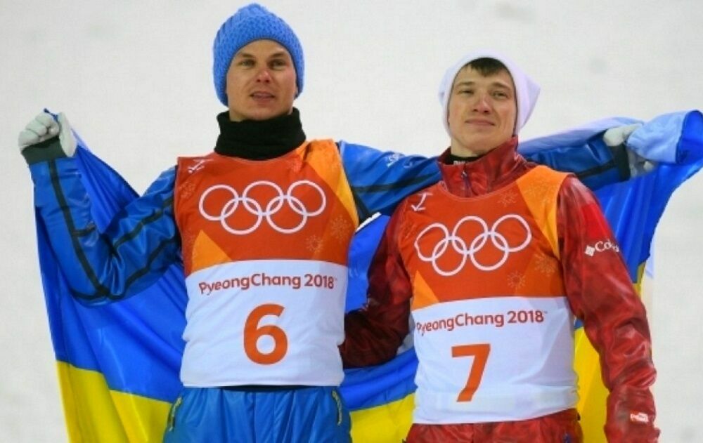 Фото дня: украинский и российский спортсмены на Олимпиаде под одним флагом